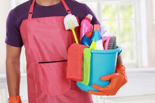 Person using a screen reader on a laptop while viewing an accessible cleaning service page