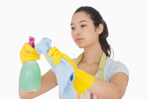 Technician managing cleaning equipment and reducing hazards
