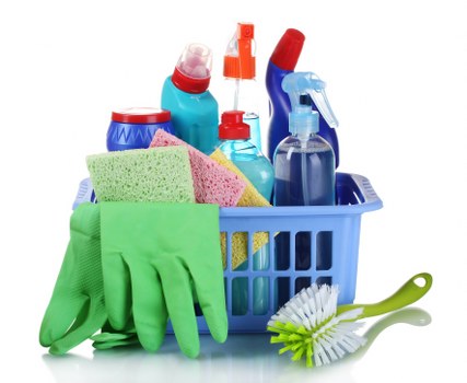 Technician using professional carpet cleaning equipment with safety awareness