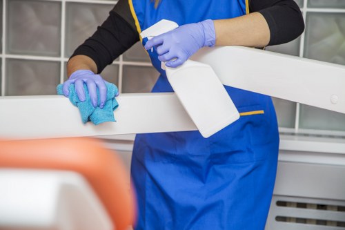 Cleaning technician reviewing booking details before starting work
